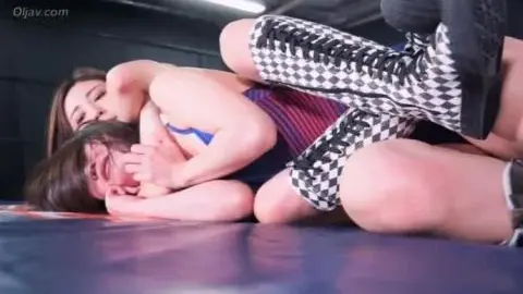 Asian Lesbians Wrestling in Ring