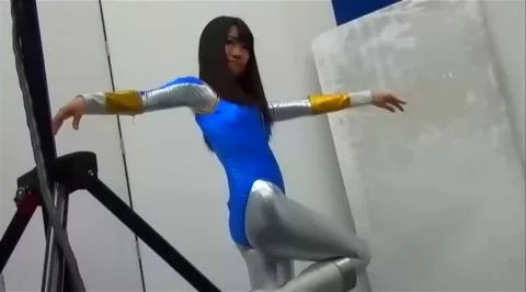 Asian Girl with Long Black Hair in Industrial Setting