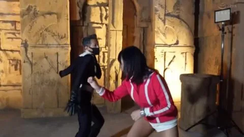 Asian Couple Fights in Ancient Temple Ruins