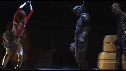 Swordplay and Intimate Encounter in Dimly Lit Setting