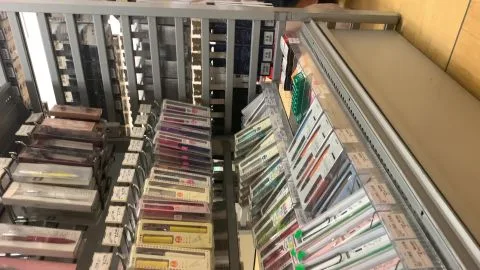 Asian Schoolgirl in Bookstore