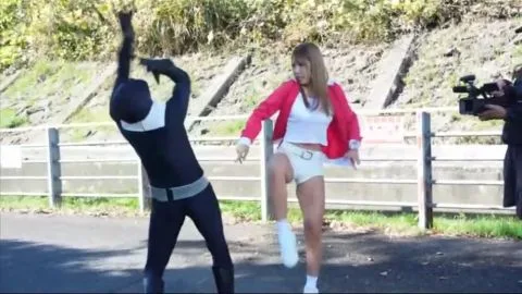 Asian Performers Dancing in Costumes