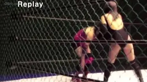 Asian Women Wrestling in Chain Link Fence Ring