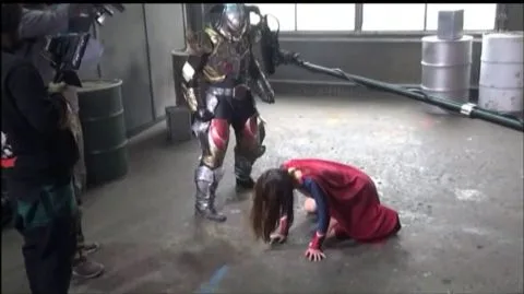 Asian Superhero and Armored Warrior Fight