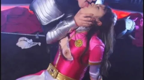 Asian Couple in Pink Ranger Costumes Intimate Encounter