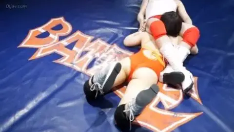 Asian Women Wrestling in Red Attire
