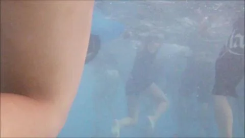 Asian Couples Poolside Intimacy