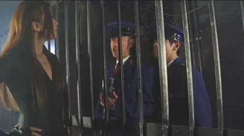 Asian Couple in Black Clothing Intimate Moments