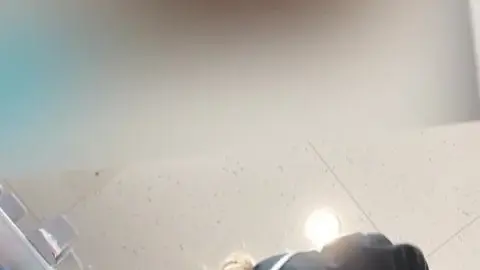 Blonde Teen Sits with Legs Apart and Masturbates