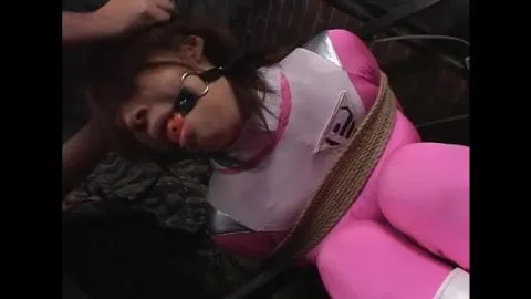 Asian Woman in Pink Bodysuit Restrained and Gagged