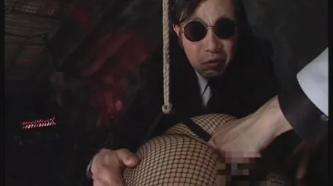 BDSM Scene with Bondage and Restraint