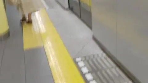 Asian Girl in Subway Station