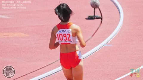 Asian Athletes in Action on the Track
