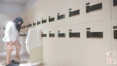 Asian Girl Changing Clothes in Locker Room