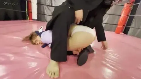 Asian Couple Wrestling and Intimacy on Pink Mat