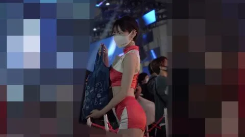 Asian Model in Red Outfit and White Mask Posing