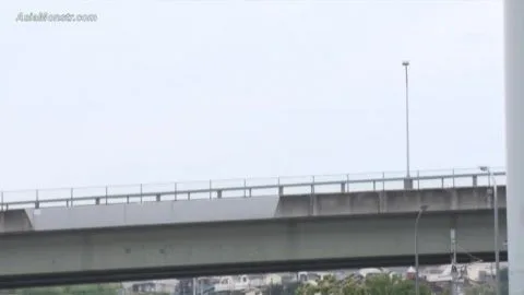 Asian Couple in Uniform Interact on Bridge and Wooden Room