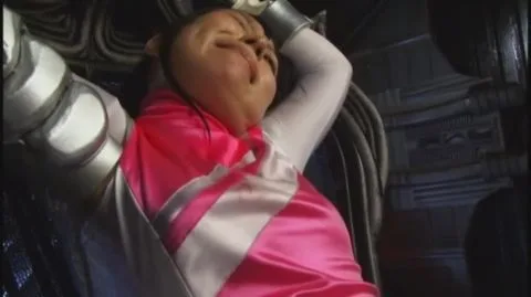 Futuristic Bondage Scene with Asian Performer