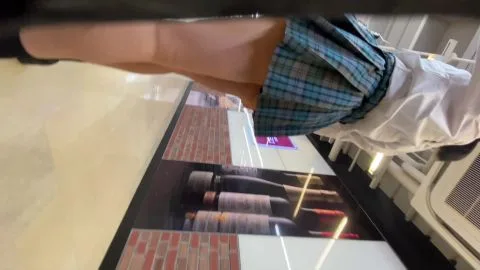 Asian Girl Shopping in Store