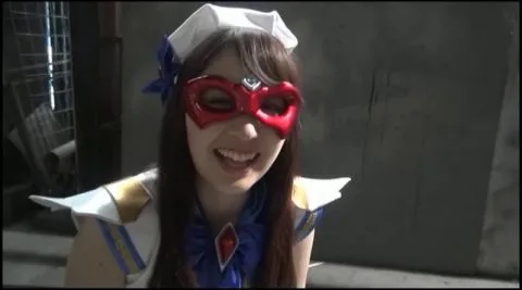 Asian cosplayer in red mask and blue costume