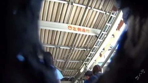 Asian Women in Intimate Moments on Public Transport