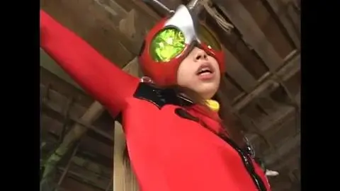 Asian Performers in Red Costumes and Fetish Gear