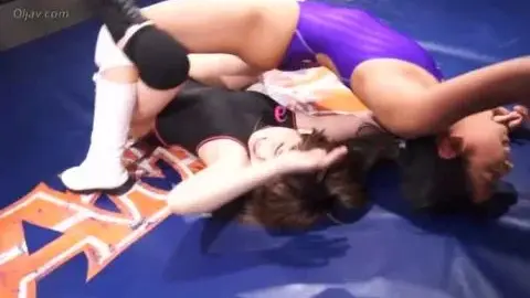Asian Lesbians Wrestling in Ring