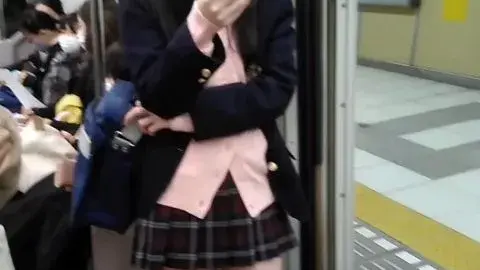 Asian Schoolgirl in Uniform on Subway