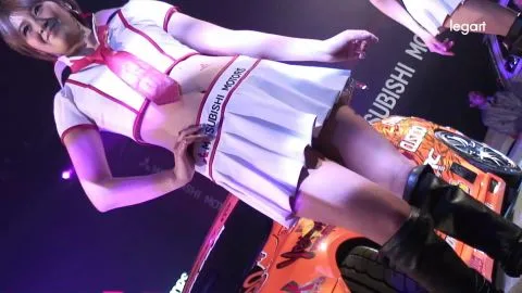 Asian Dancers on Stage with Motorcycle Prop