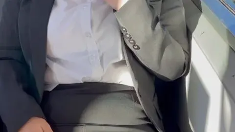 Brunette in Mask on Train