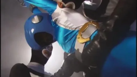 Muscular Men in Costumes Engage in Mock Fight