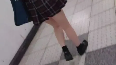 Asian Schoolgirls in Subway Station