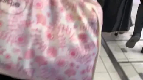 Blonde in Black Boots Caught on Camera