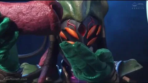 Muscular Asian Male in Red and Green Costume