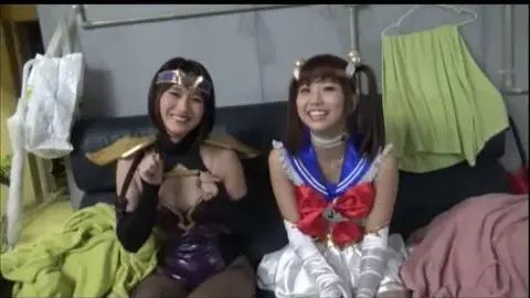 Asian Cosplay Duo Perform on Stage