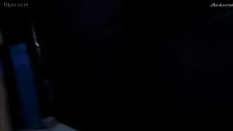 Asian Woman in Boxing Ring with Male Partner