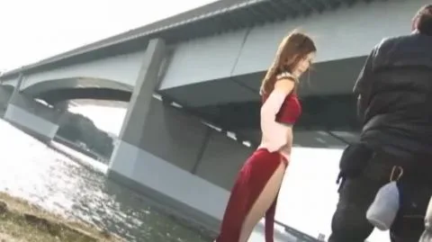 Asian Women in Red Outfits Engage in Intimate Scenes