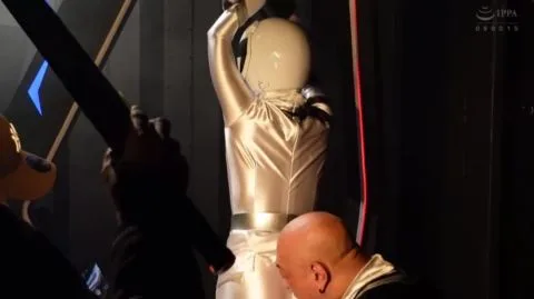 Asian Performer in Metallic Costume