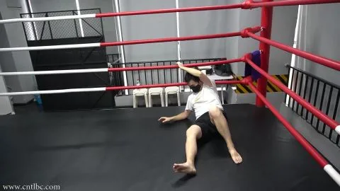 Asian Couple in Boxing Ring Encounter