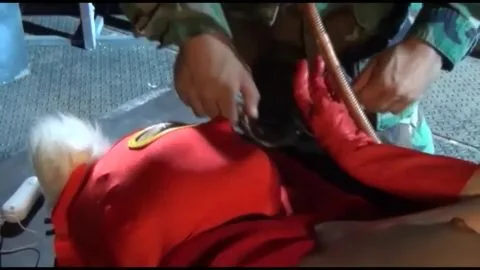 Blonde Men in Red Costumes