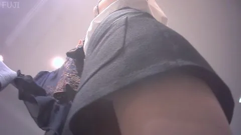 Asian Lesbians in Clothing Store Intimacy