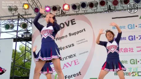 Asian Cheerleaders Perform on Stage