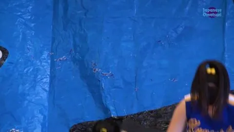 Asian Performers Dancing on Stage