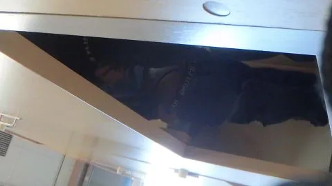 Blonde in Black Top Under Desk POV