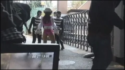 Asian Performers in Pink Outfits