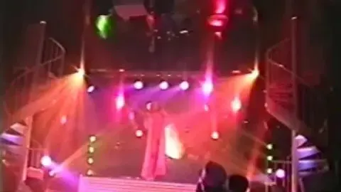 Asian Performers Dancing on Stage