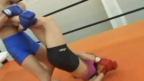 Asian Lesbians Wrestling in Martial Arts Ring