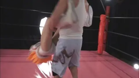 Asian Lesbians Wrestling in Ring