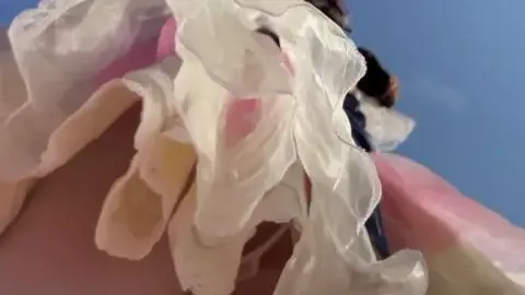 Asian girl in white dress outdoors