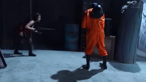 Asian couple in red dress industrial BDSM scene